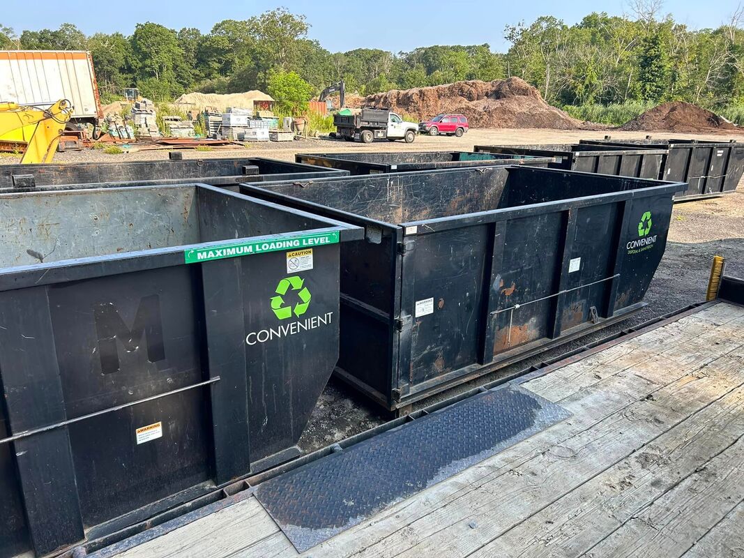 image of dumpsters in company yard
